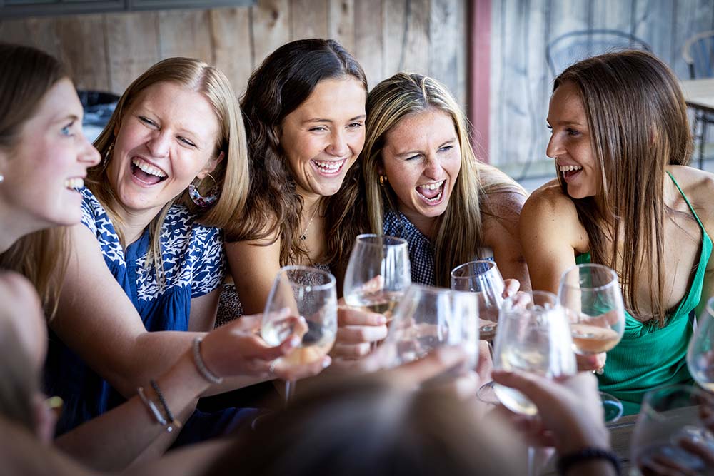 Group of women enjoying a group wine experience