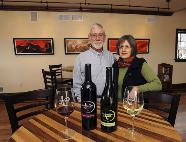 Vineyard at Grandview owners Larry and Marilyn Kennel show off the winery's newly opened tasting room. (Jeff Ruppenthal/Staff)